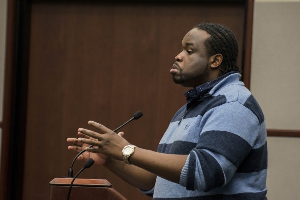 <p>Vauhxx Booker of Bloomington’s Black Lives Matter group speaks against the recent purchase of an armored truck by the City of Bloomington. He talked during the public report section of Wednesday’s Bloomington City Council meeting.</p>