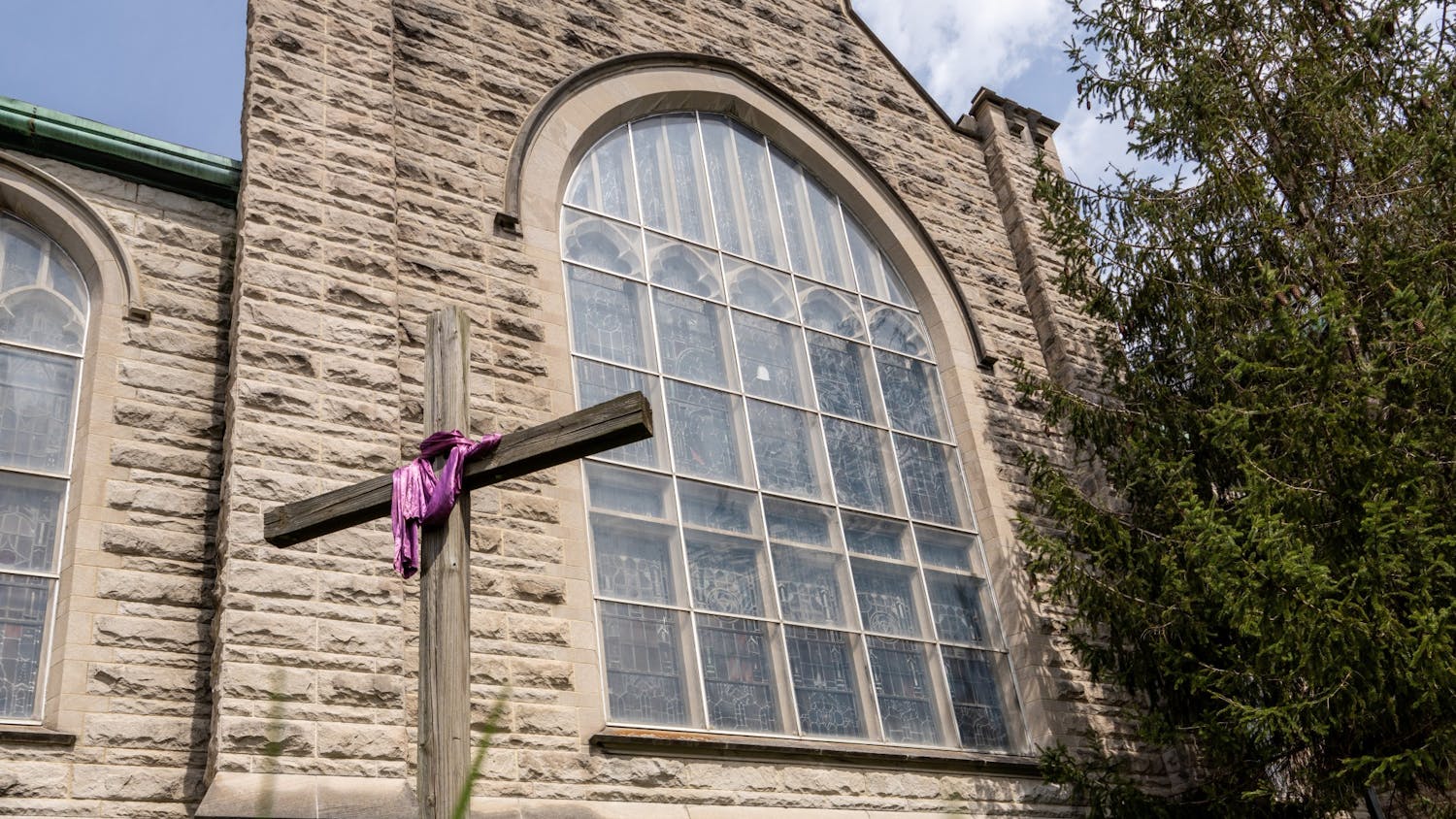 A cross stands April 7 in from of First United Methodist Church in Bloomington.