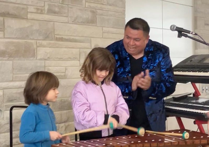 Music, marimba and melodía: Isaac Salazar brings joy to Bloomington Farmers' Market
