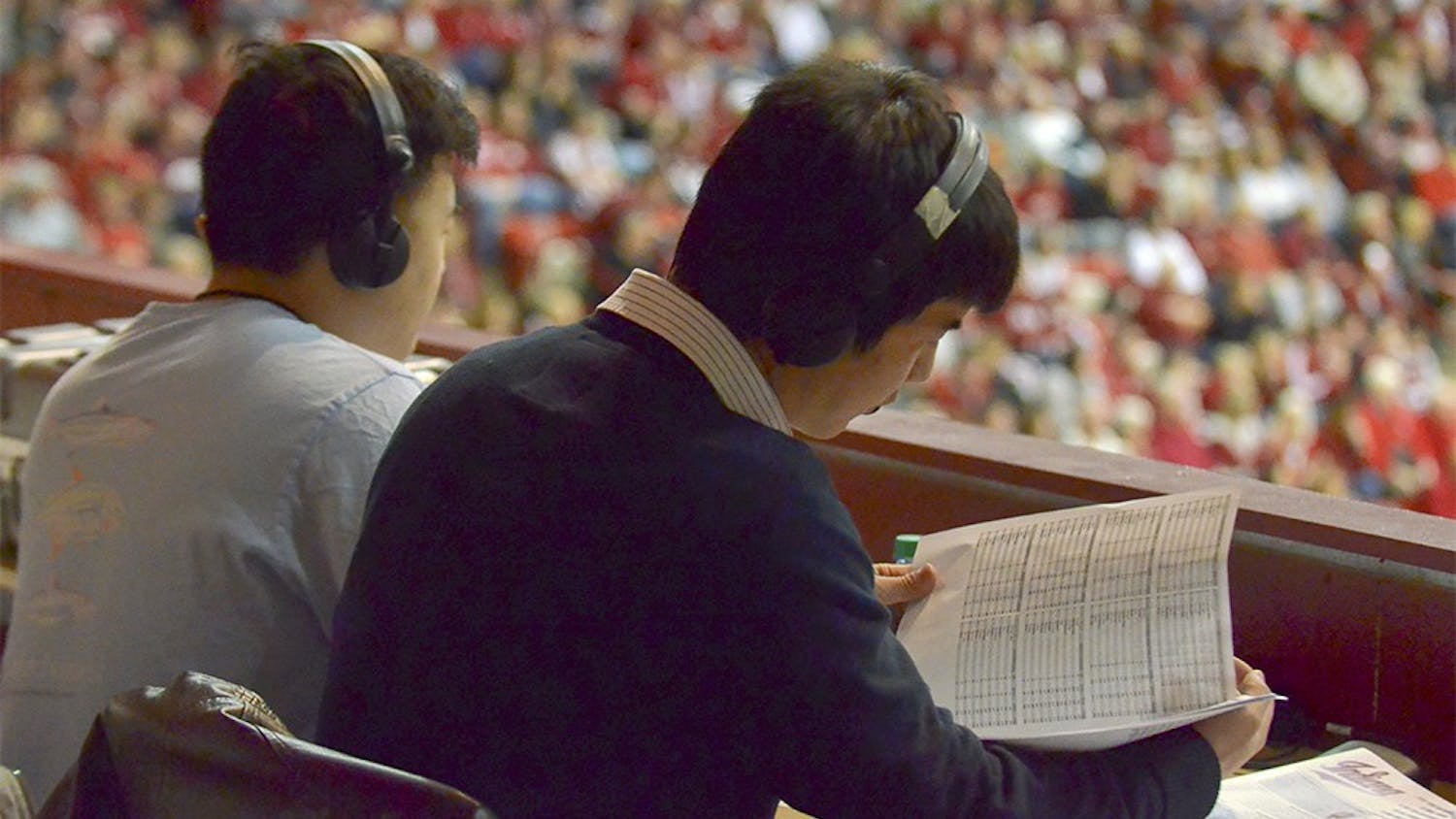 Mandarin-speaking broadcasters announce the IU basketball game against Ohio State in Mandarin on Sunday at Assembly Hall.
