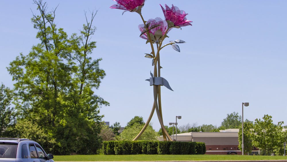 A sculpture which cost about $352,900 and is titled “Grace, Love and Joy” stands in the middle of a roundabout in Carmel, Indiana.
