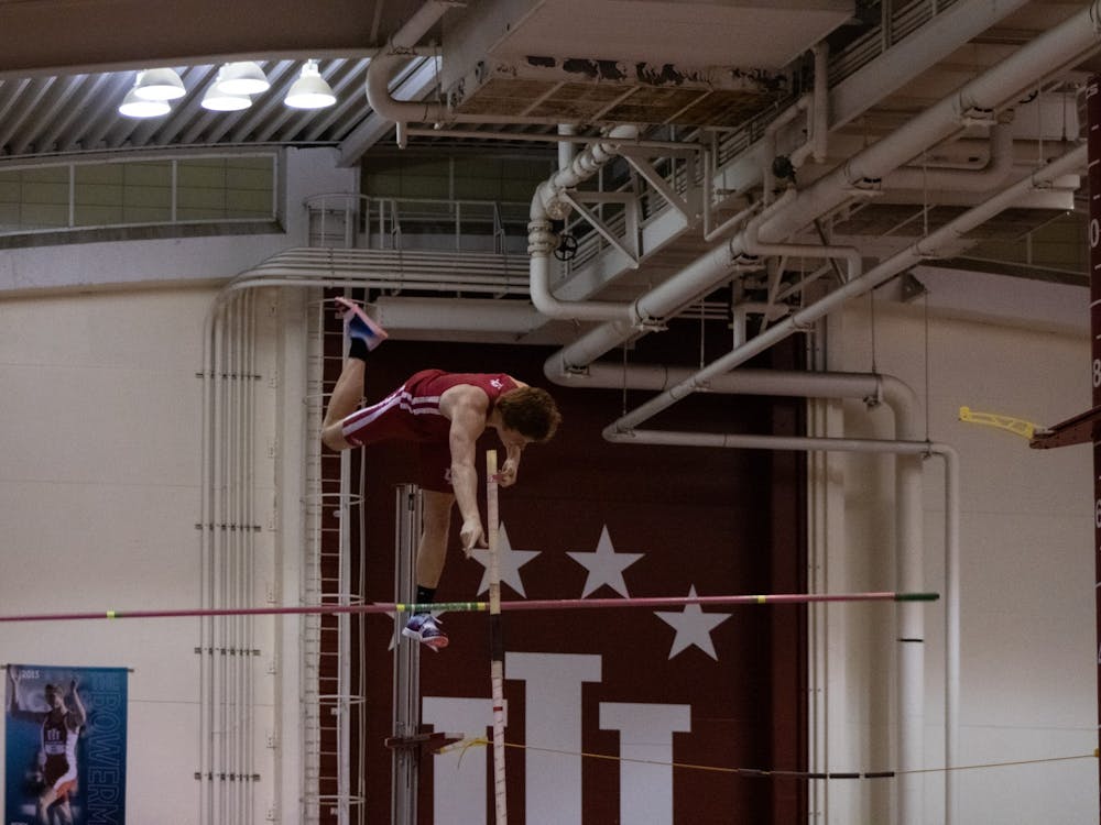 Junior Nathan Stone finishes participating in the pole vault event at the Hoosier Hills meet Feb. 11, 2022. 14 Indiana men’s track and field athletes earned bids to NCAA East Preliminary Round. 