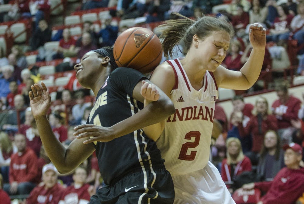 Freshman guard Jess Walter moves away from a rebound after an IU free throw at Assembly Hall on Monday. IU won 72-55 and will play its next game against Northwestern on Thursday.