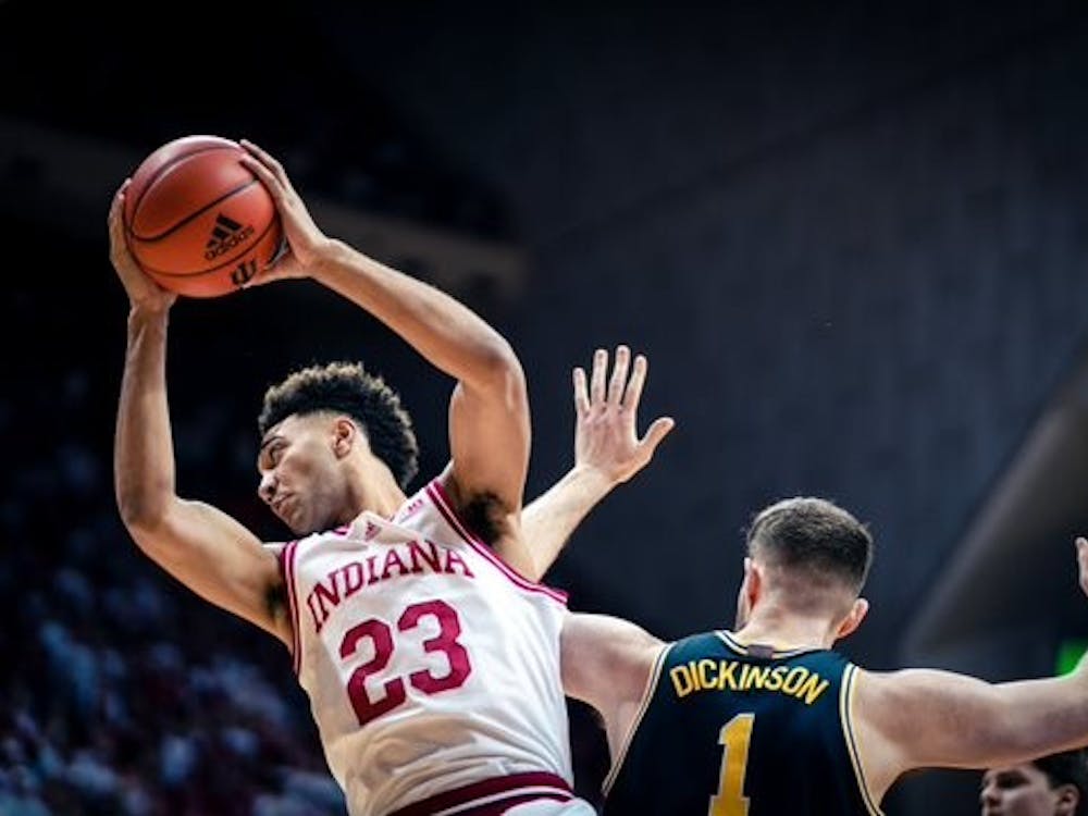 Senior forward Trayce Jackson-Davis grabs a rebound March 5, 2023, at Simon Skjodt Assembly Hall in Bloomington. Indiana defeated Michigan 75-73.