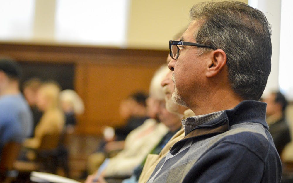 IU students and Bloomington residents listen as Informatics Professor John Duncan speaks on the safety of his students during the Bloomington Faculty Council assembly Thursday afternoon in President’s Hall. The meeting featured the appearances of Provost Lauren Robel, Mayor John Hamilton, and representatives from IUSA. 