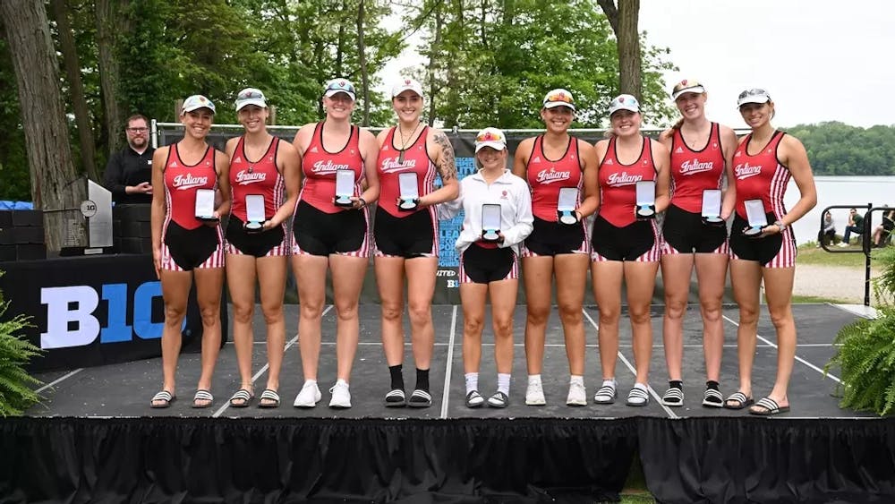 Members of Indiana University&#x27;s First Varsity Eight boat receive the silver medal Sunday. No. 15 Indiana scored its best-ever finish at the Big Ten Championships. 