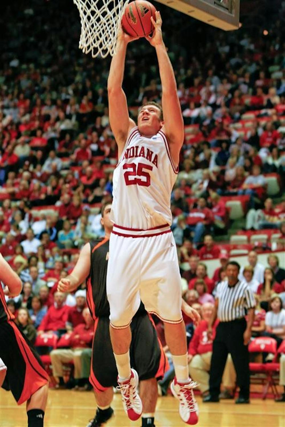Freshman forward Tom Pritchard goes up for a dunk during IU's 103-71 victory over Anderson on Saturday at Assembly Hall.