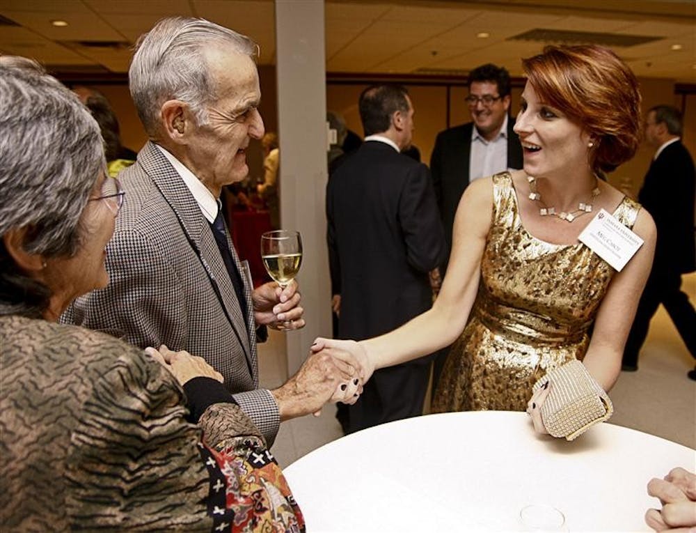 Meg Cabot, right, greets alumni and guests at the 2008 College of Arts and Sciences Annual Recognition Banquet on Nov. 12, 2008&nbsp;in the Solarium. Cabot will be returning to IU on Monday night for a book signing.&nbsp;