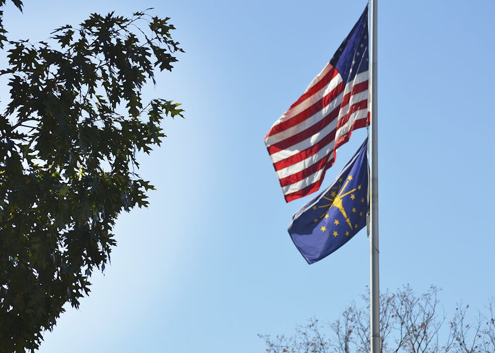 <p>An American flag waves Oct. 17, 2017, outside of Franklin Hall. Organizations around Bloomington will host events to honor veterans throughout the month of November.</p>