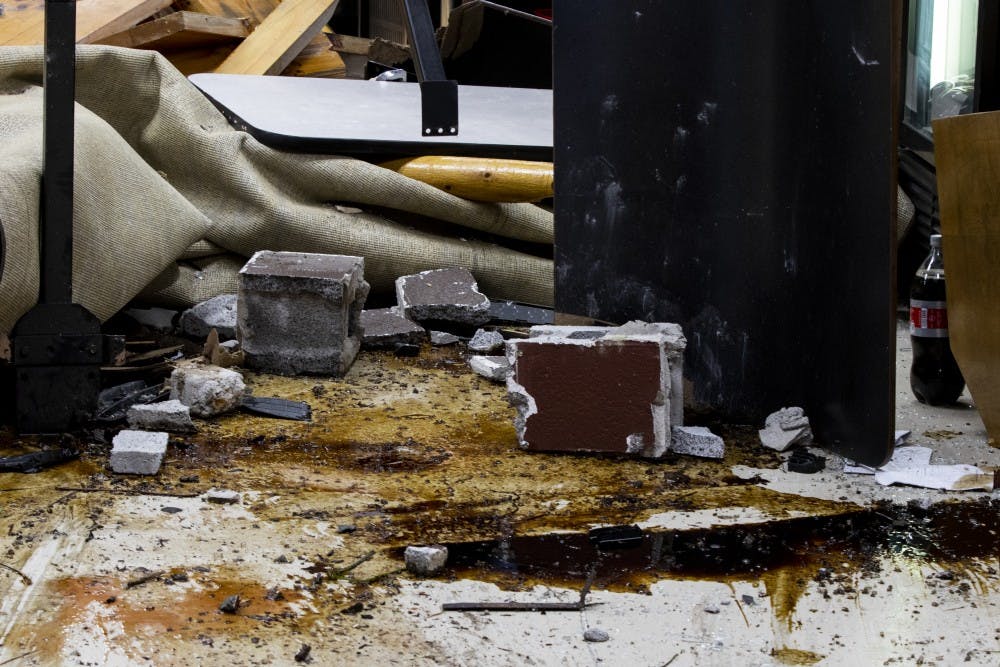 GALLERY: Man drives car at least 50 feet through Trailhead Pizzeria in Bloomington