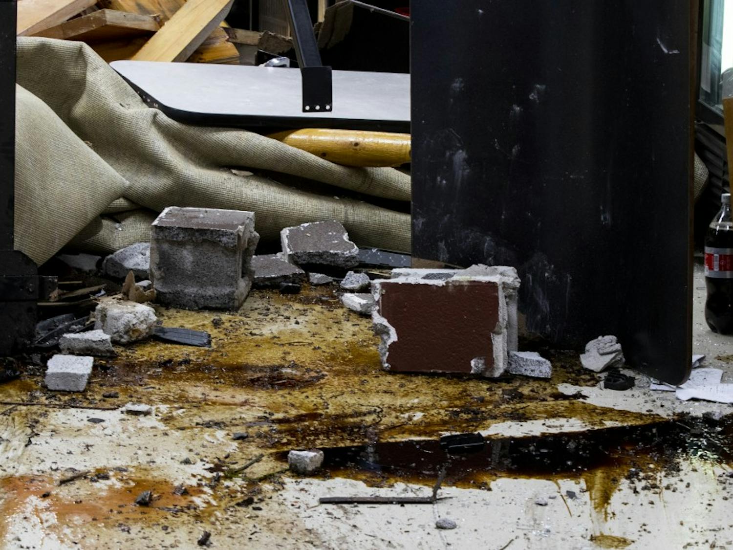 GALLERY: Man drives car at least 50 feet through Trailhead Pizzeria in Bloomington