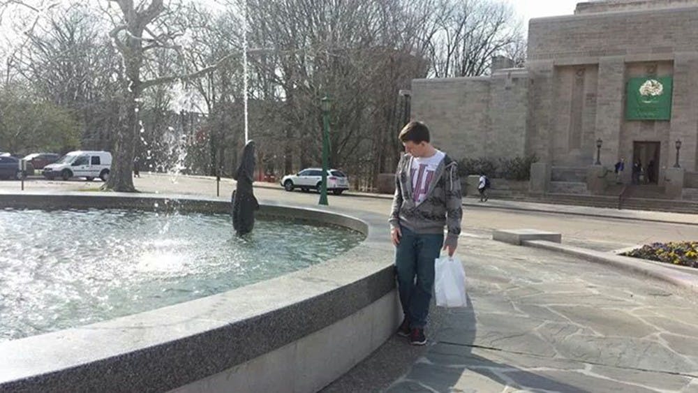 Anthony Wilkerson walks by the Showalter Fountain during Red Carpet Day at Indiana University. Wilkerson passed away on November 20 in his hometown of Indianapolis.