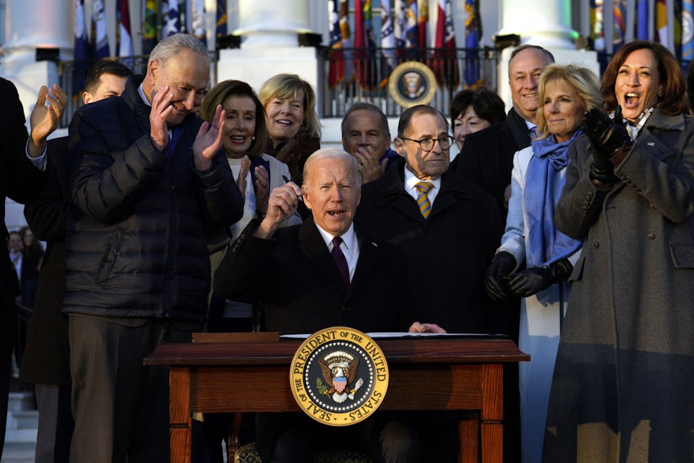 <p>President Joe Biden signs the Respect for Marriage Act during a ceremony on the South Lawn of the White House Dec. 13, 2022, in Washington, D.C. The bill federally protects the recognition of same-sex and interracial marriages.</p>