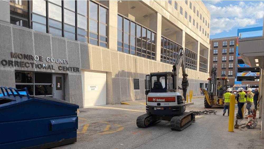Workers repair a gas leak Sept. 20, 2023, outside the Monroe County Correctional Center. The Monroe County Correctional Center went on lockdown and conducted an evacuation plan Wednesday following a gas leak that occurred outside the building.