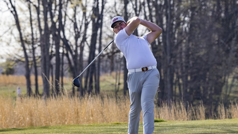 Then-freshman Drew Salyers follows through his swing after hitting the ball during the Hoosier Collegiate Invitational April 4, 2021, at the Pfau Golf Course. Indiana finished seventh in the Fighting Illini Collegiate this weekend.