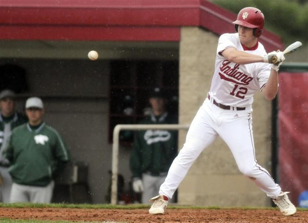 IU designated hitter Alex Dickerson eyes a pitch during a game against Chicago State on Tuesday at Sembower Field.