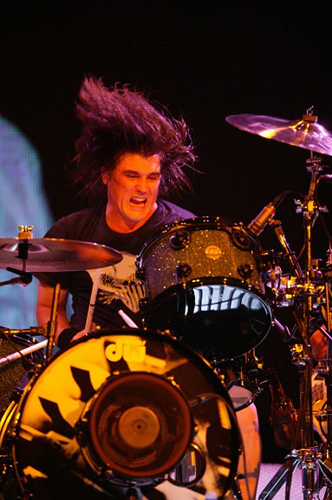 3 Doors Down’s Greg Upchurch means business
during live performances.