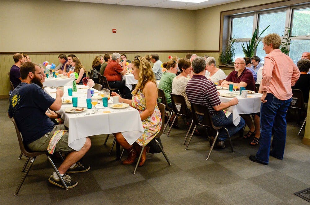 Local residents eat brunch at "Brunch upon a time" at the Community Kitchen of Monroe County on Sunday. The brunch was a fundraising event to support the Community Kitchen. 
