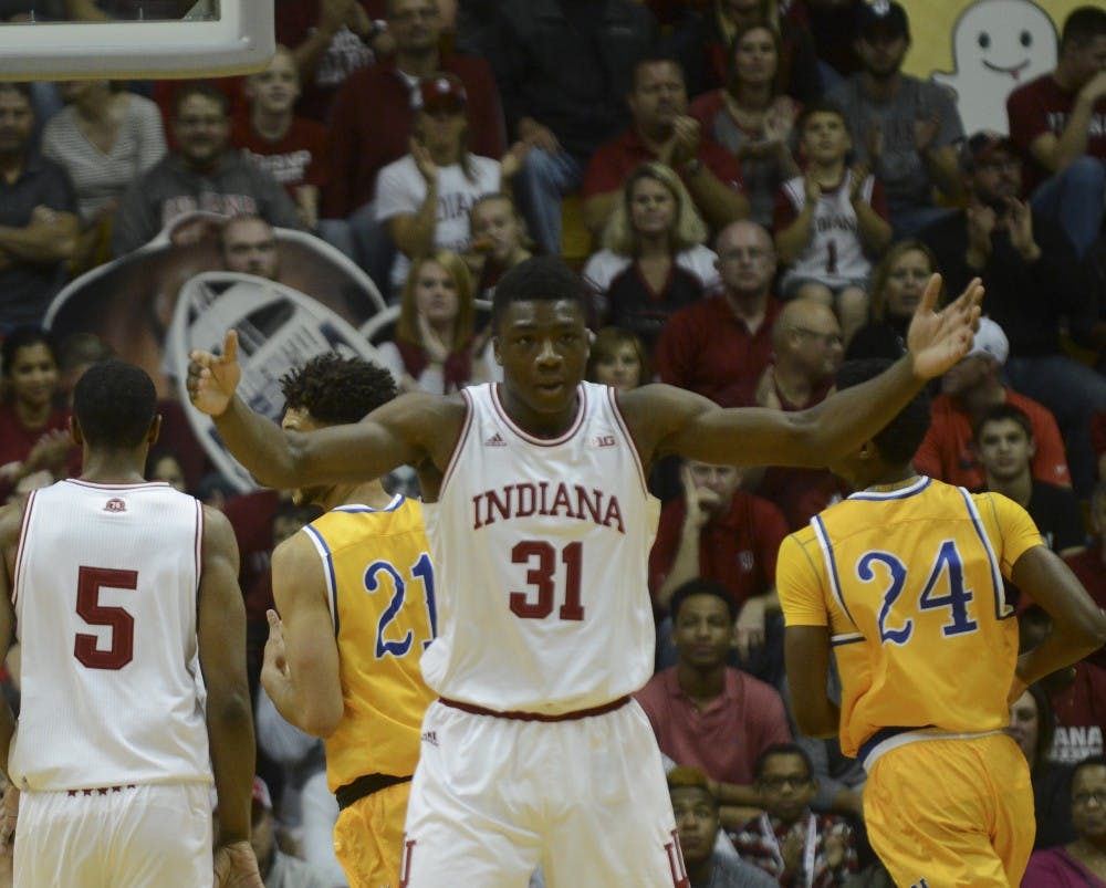 Freshman center Thomas Bryant tries to pump up the crowd during the game agaisnt McNeese State on Satuday at Assembly Hall. The Hoosiers won, 105-60.