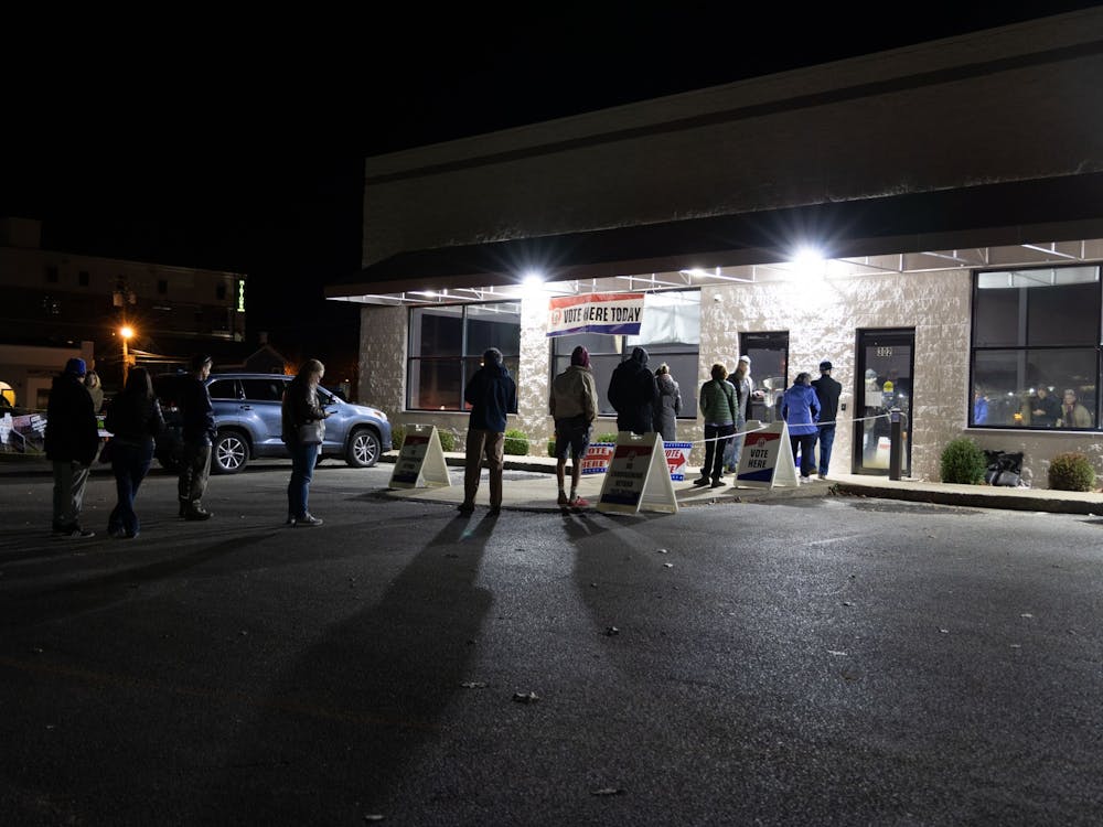 People wait outside Election Central to cast their ballots Nov. 8, 2022, at 302 S. Walnut St. 