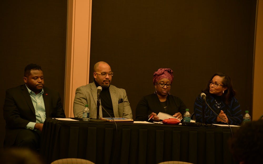 Panelists at the event "Black Don't Crack" discuss current issues regarding access to health care in the black community. Panelists were, from left to right, Rory James, Rasul Mowatt, Maria Hamilton Abegunde and Dr. Lori Thompson.