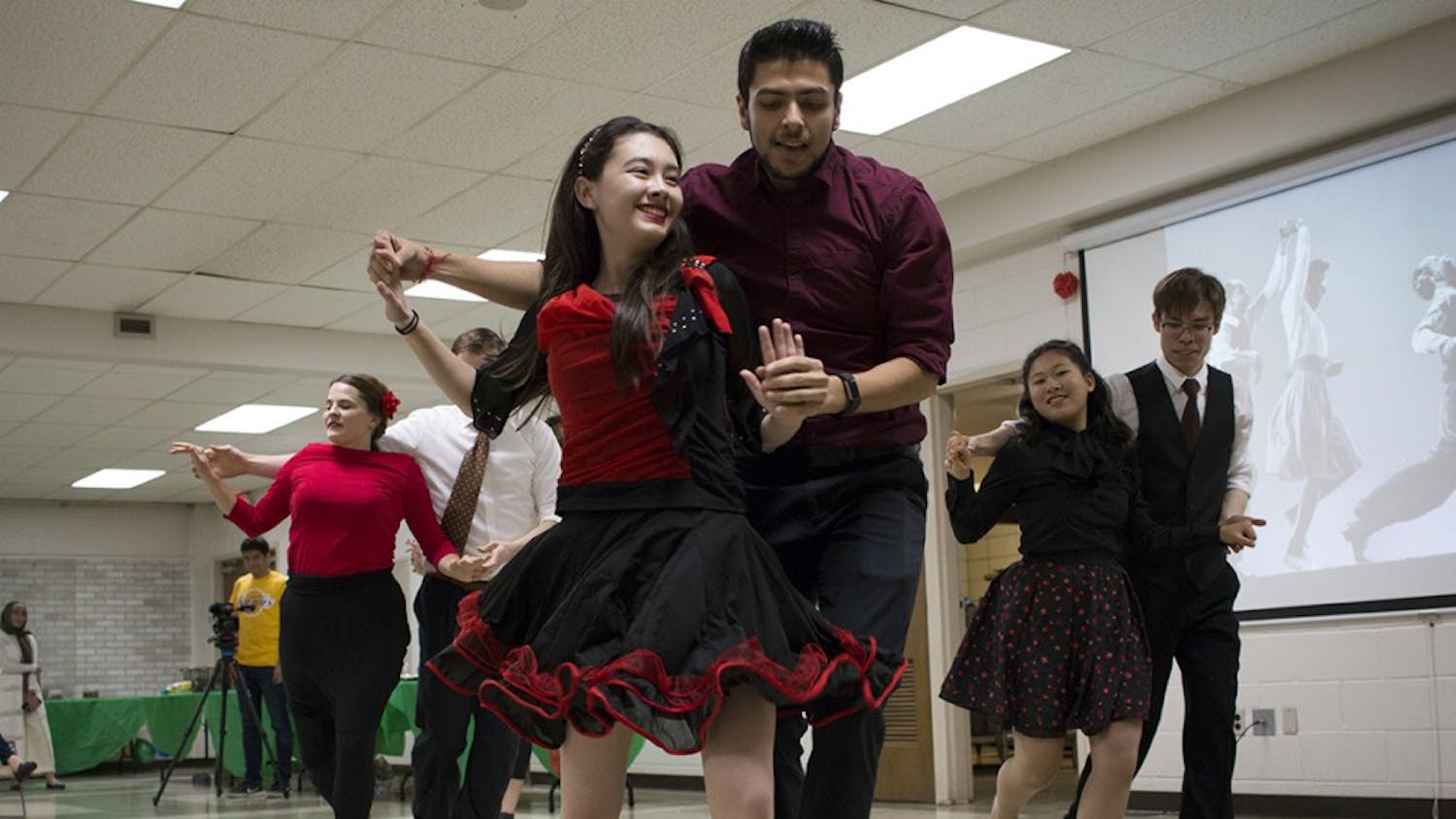 Liberty Forster and Avinash Divecha perform with the IU Swing Dance Club at the International Dance Night to welcome Venezuelan refugees. The Swing Dance Club was the first performance of the evening.