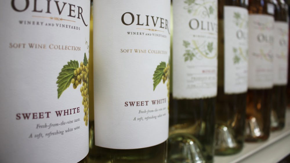 Oliver Winery wine bottles are pictured. Oliver Winery has been purchased by New York private equity firm NexPhase Capital.