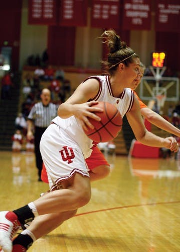 Brandon Foltz / IDSIU senior guard Nikki Smith drives along the baseline during the Hoosiers' 70-62 win over Illinois Jan. 6 at Assembly Hall. The Hoosiers will go against Minnesota Thursday evening at 7 p.m.