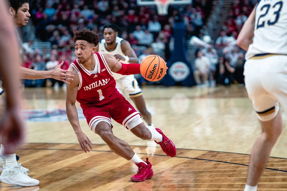 <p>Senior guard Rob Phinisee drives to the basket during the first half of the crossroads classic between Indiana and Notre Dame on Dec. 18, 2021. Indiana will play its final home game of the regular season against Rutgers at 7 p.m. Wednesday.</p>
