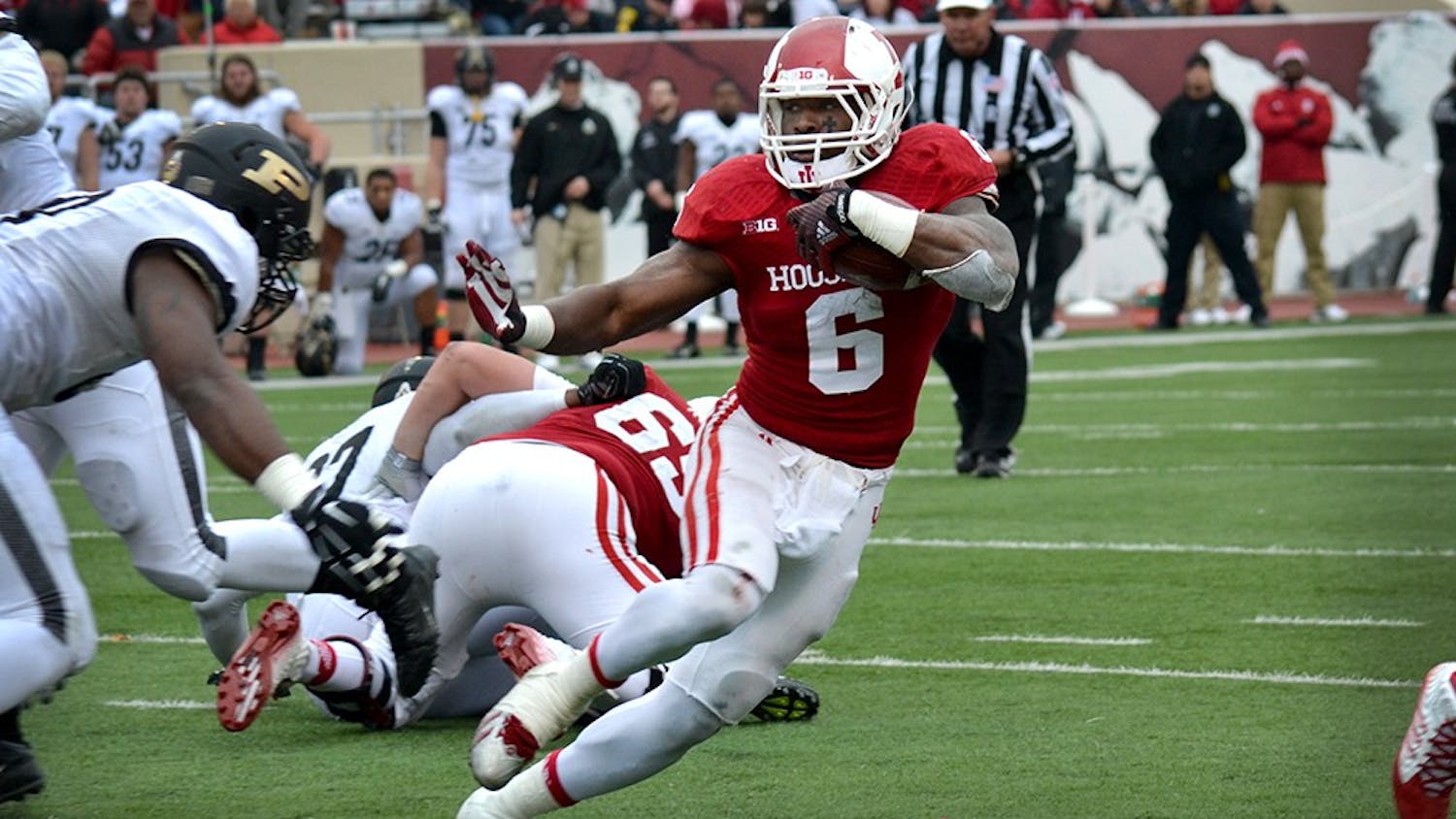 Junior running back Tevin Coleman runs the ball during IU's game against Purdue on Saturday at Memorial Stadium. Coleman surpassed 2,000 yards rushing on the season during the Hoosiers' final game of the year.