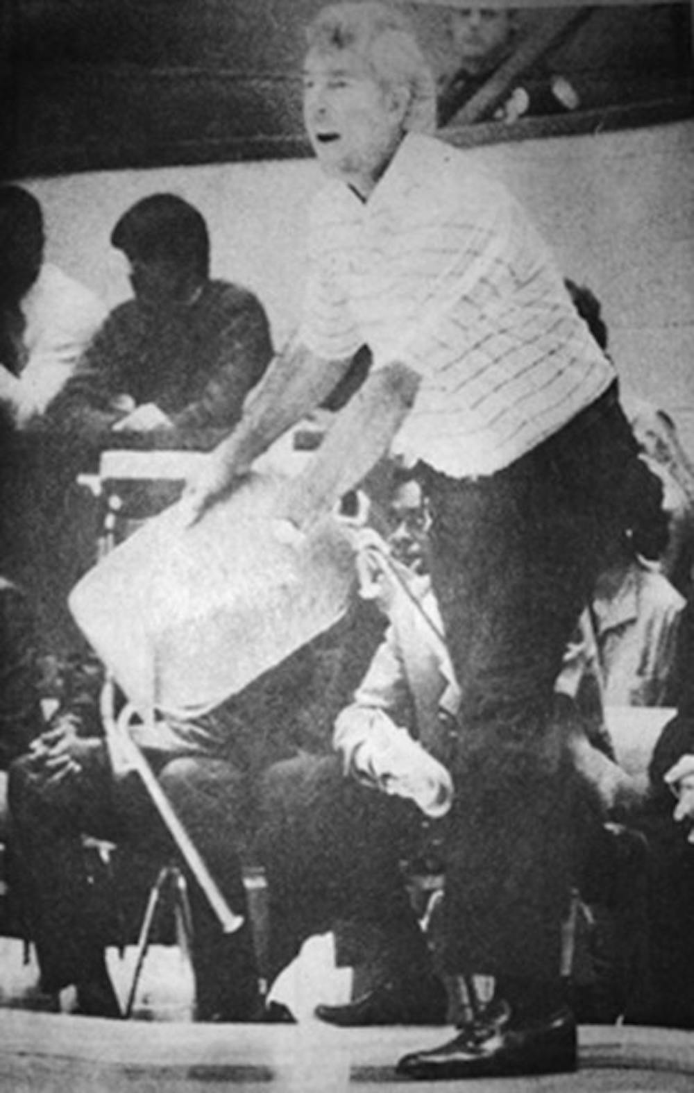 Coach Bob Knight throws a chair. February 24, 1985.