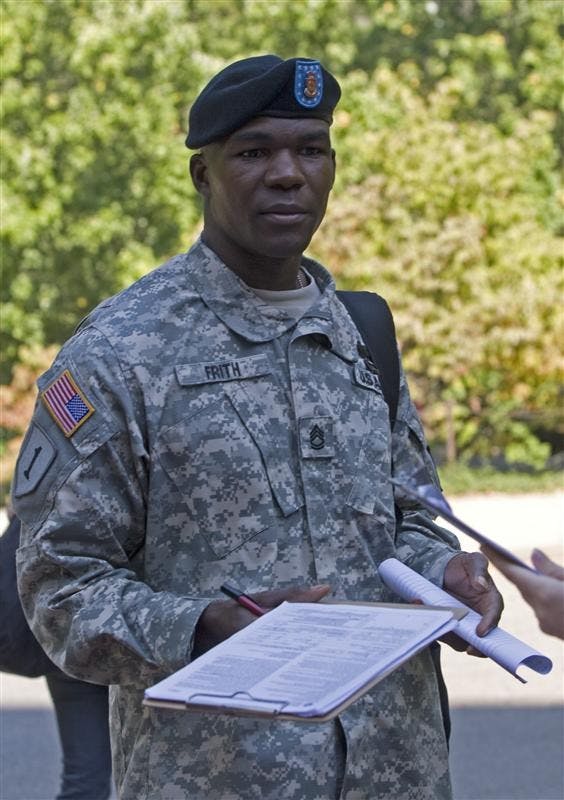Military Science student/faculty member Mendez Frith hands in his voter registration form outside Ballantine Hall Tuesday afternoon.  Both Democratic and Republican student groups are pushing voter registration strongly as Indiana's deadline of October 6 approaches.