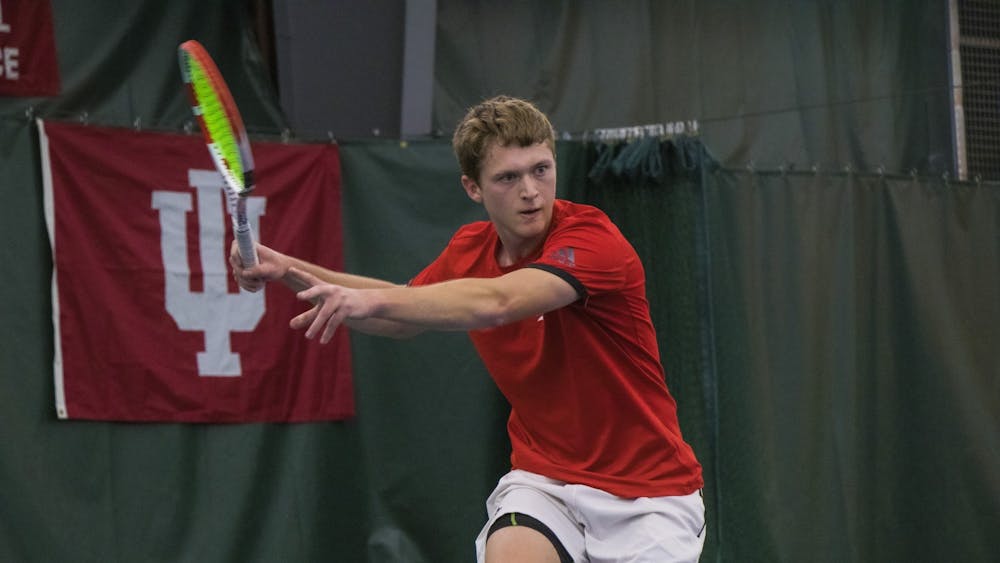 Then-junior Carson Haskins watches the ball during a match against the University of Notre Dame Feb. 1, 2020, at the IU Tennis Center. Ilya Tiraspolsky lost to Michigan in the semifinal of Big Ten Individuals.