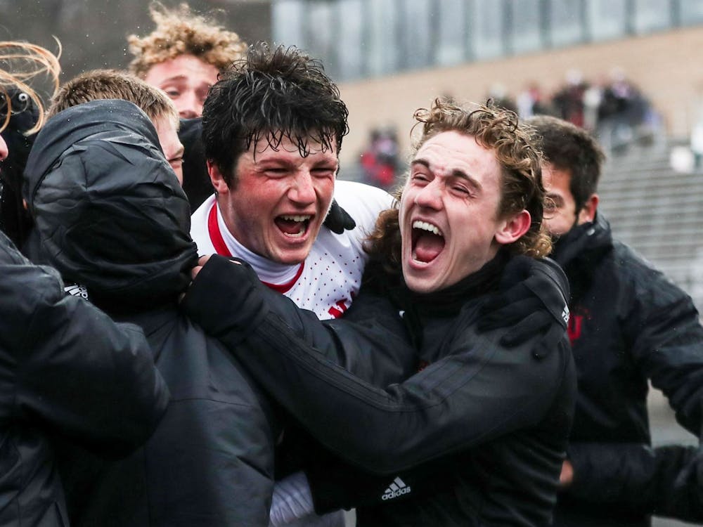 Then-sophomore redshirt defender Daniel Munie celebrates with his teammates after scoring the game-winning goal against Rutgers University on March 19, 2021, at Bill Armstrong Stadium. IU was one of four teams with players in the top 50 of Top Drawer Soccer&#x27;s Top 100 Players to Watch list.