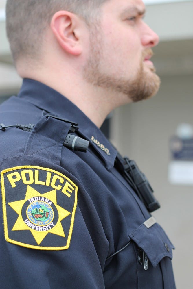 Officer Chad Warner wears a shoulder mounted camera Wednesday in field test.