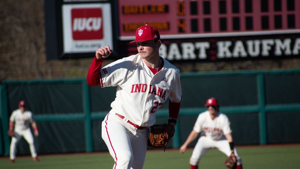 Junior right-handed pitcher Brooks Ey completes a pitch on February 28, 2023, against Butler University at Bart Kaufman Field in Bloomington, Indiana.