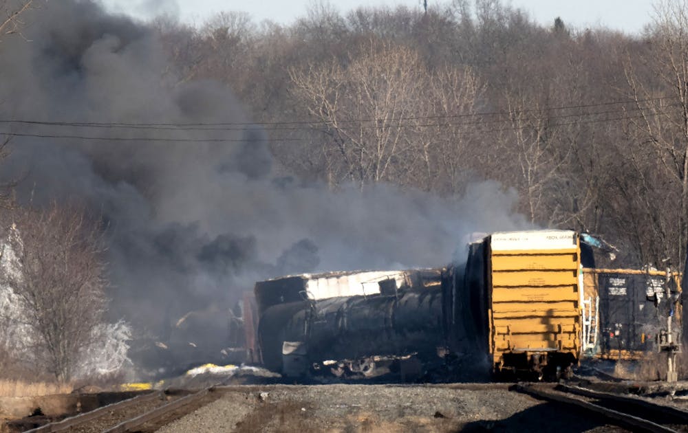 <p>Smoke rises from a derailed cargo train in East Palestine, Ohio, on Feb. 4, 2023. The U.S. Environmental Protection Agency decided to transport the waste to Roachdale.  </p>
