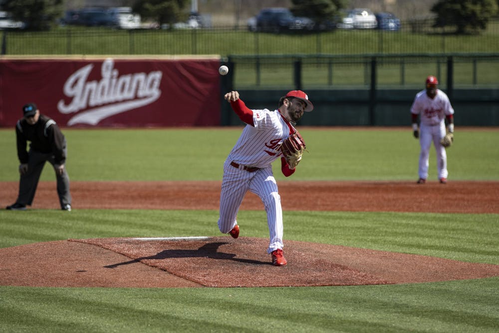<p>Senior pitcher Bradley Brehmer pitches against Northwestern on April 2, 2022, at Bart Kaufman Field. Indiana lost its weekend series to Northwestern 1-2 in Bloomington.</p>