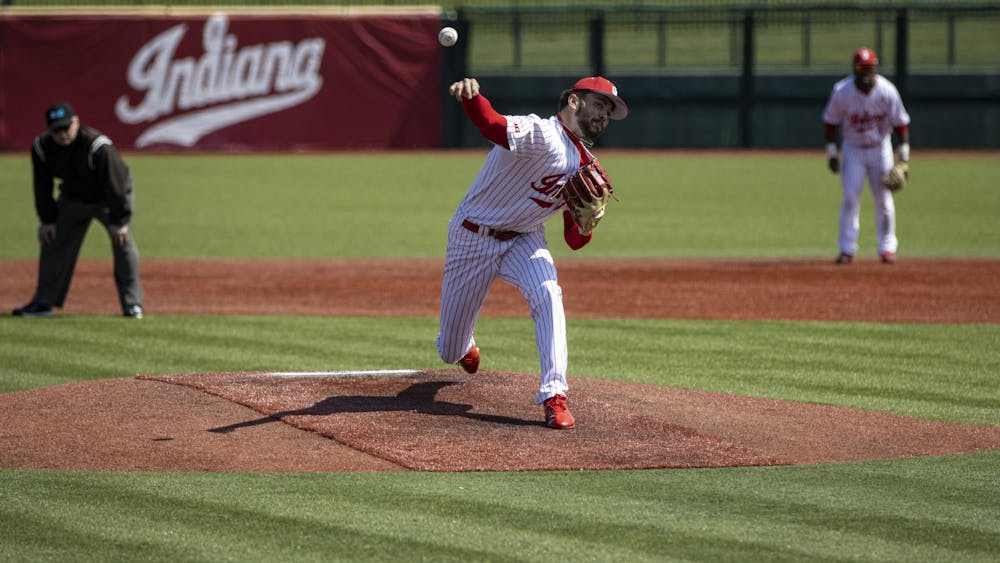 Senior pitcher Bradley Brehmer pitches against Northwestern on April 2, 2022, at Bart Kaufman Field. Indiana lost its weekend series to Northwestern 1-2 in Bloomington.