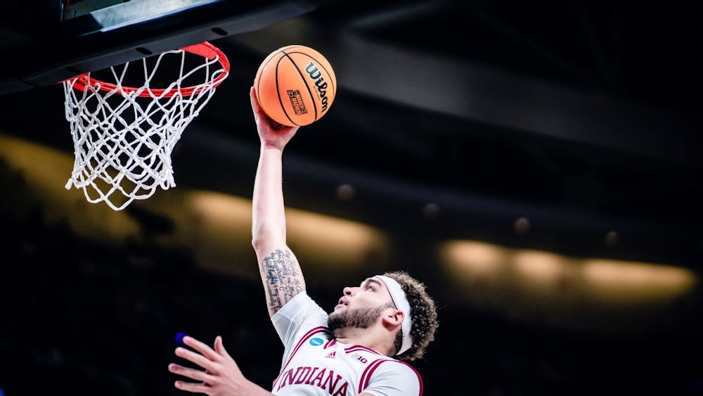 Graduate senior forward Race Thompson puts up a shot March 19, 2023, at MVP Arena in Albany, New York. Thompson will compete in the Portsmouth Invitational starting tonight.