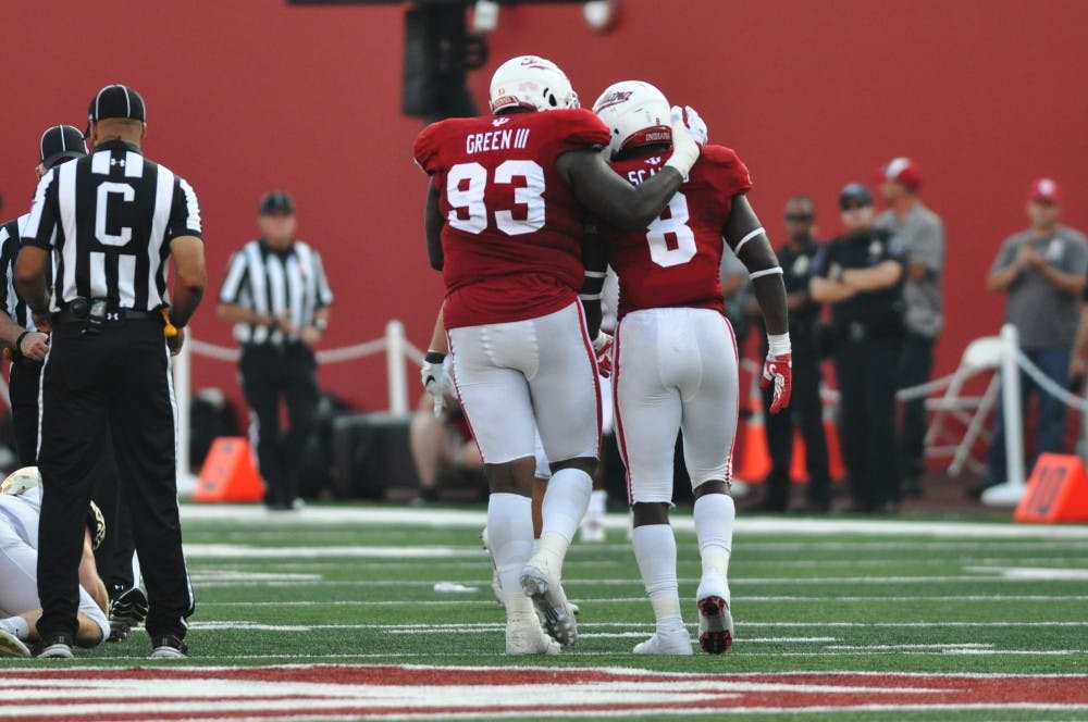 Senior Ralph Green III and Junior Tegray Scales on the field Saturday at Memorial Stadium. IU lost to Wake Forest 33-29.