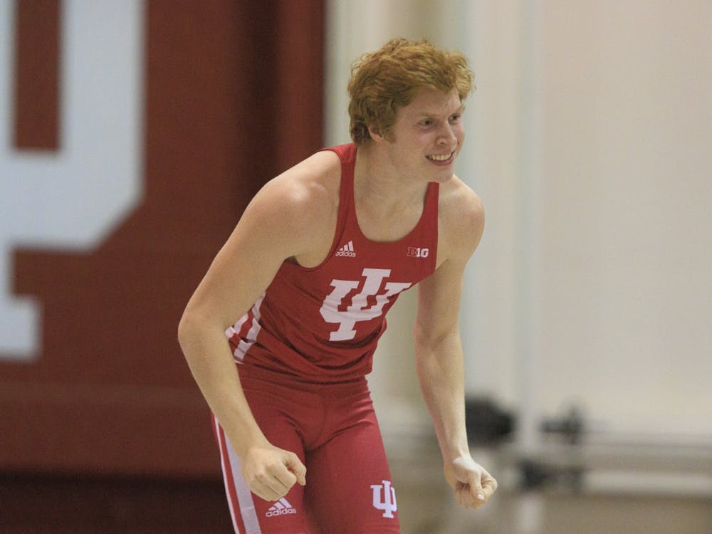 Junior pole vaulter Nathon Stone smiles after his attempt on Feb. 11, 2022, at Gladstein Fieldhouse. Stone took first place in the pole vault at the Florida Relays with a mark of 5.36 meters.