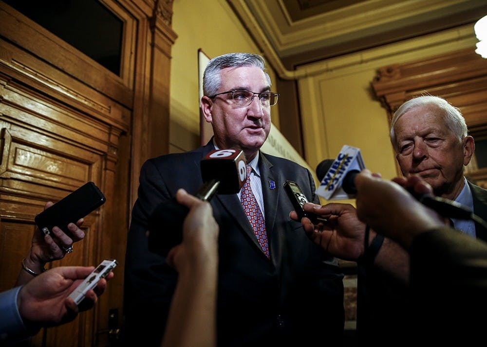 Gov. Holcomb interviews with the media after the press conference on the opioid crisis initiative Tuesday at the Indiana Statehouse in Indianapolis. The Indiana University "Grand Challenge" plans to target the opioid crisis while partnering with the Governor's Office and IU Health.
