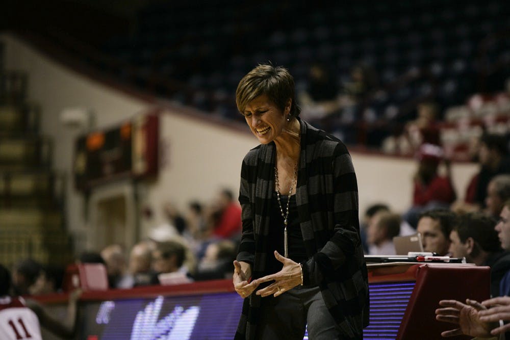 Head coach Teri Moren celebrates after the Hoosiers scored off a rebound. The Hoosiers beat Chattanooga 54-43 on November 17, 2015. 