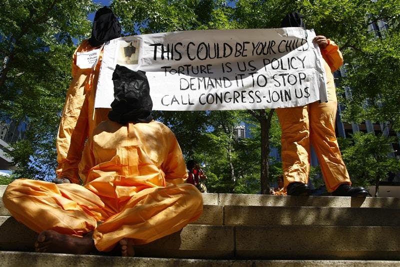 Members of the Women Against Military Madness protest against torture on Wednesday at the Republican National Convention.