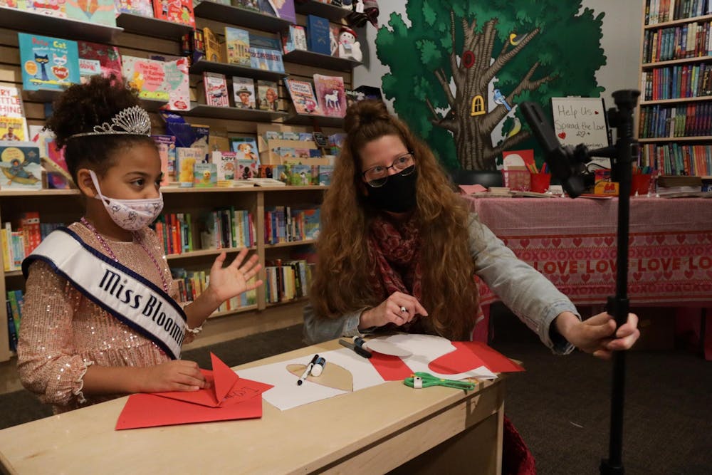<p>Miss Bloomington Anurika Enyiaku and Bloomington business owner Amie Crites livestream on Facebook about their event on Feb. 11, 2022, at Morgenstern’s Bookstore. They partnered to create cards for elderly members in the Bloomington area. </p>