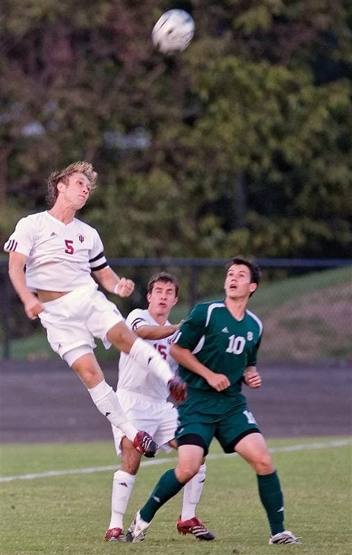 Junior midfielder Brad Ring heads the ball at a Oct. 6, 2007 game against Michigan State at Bill Armstrong Stadium. IU won 2-0.
