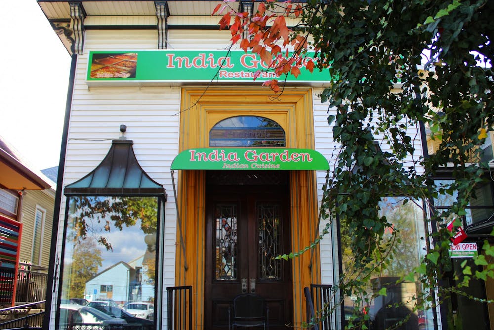 India Garden Restaurant sits behind a tree Nov. 5 on Fourth Street. India Garden is one of multiple restaurants on Fourth Street offering international fare. 