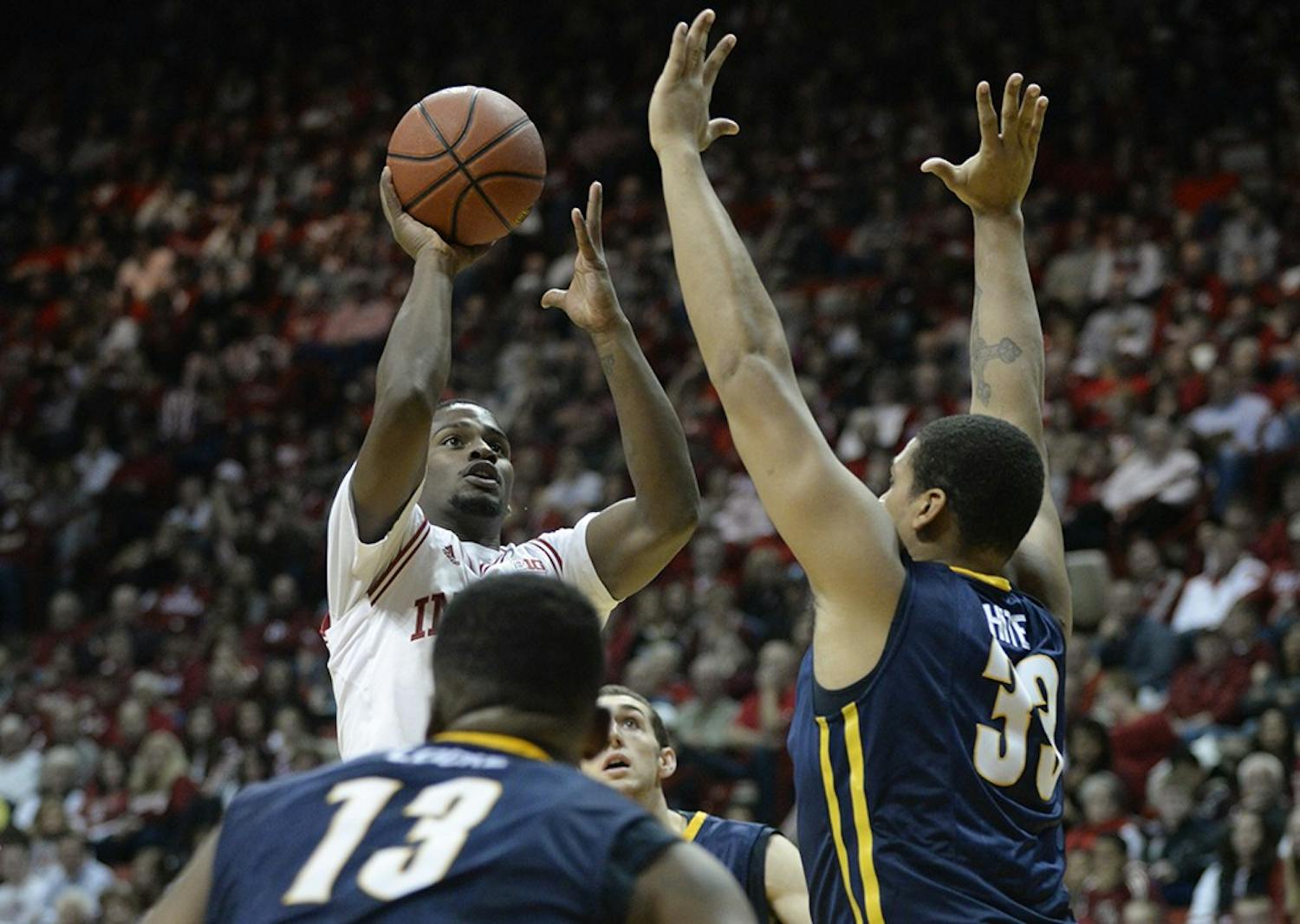 Sophomore guard Stan Robinson goes for two during IU's game against North Carolina-Greensboro on Friday at Assembly Hall.