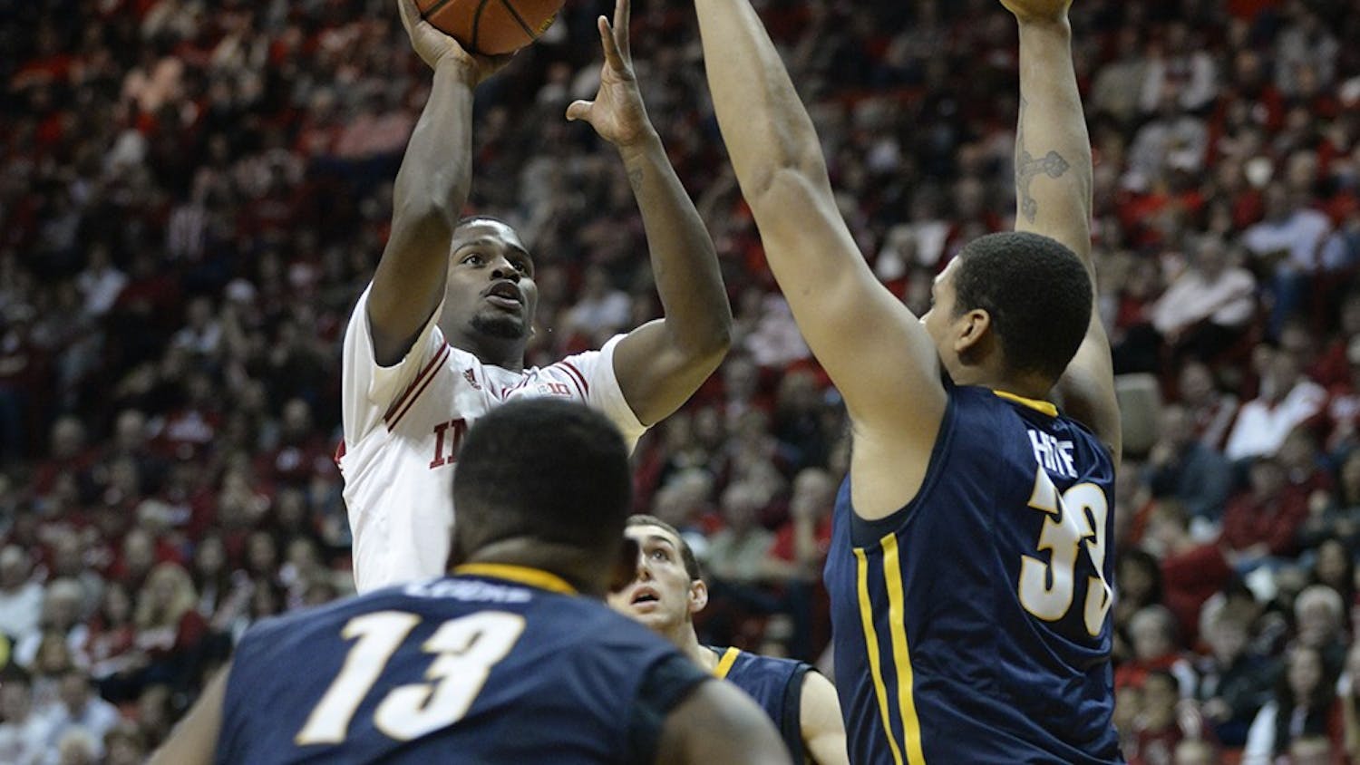 Sophomore guard Stan Robinson goes for two during IU's game against North Carolina-Greensboro on Friday at Assembly Hall.
